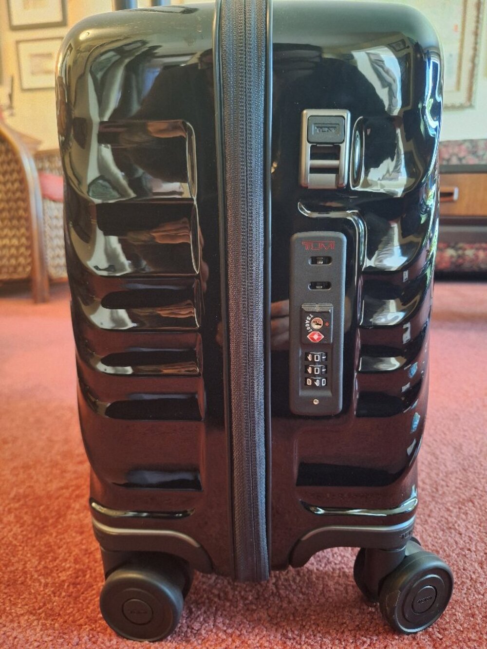 Tumi Glossy Black Hard Shell Carry-On with TSA Lock